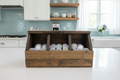 Dark walnut coffee caddy straight on in coastal kitchen